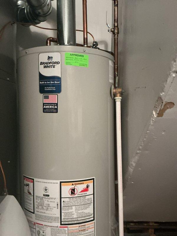Completed comprehensive Gold-level furnace inspection on a 1-year-old forced air system located near the back door. Performed thorough examination of all furnace components including inducer fan motor, burner assembly, gas valve, ignition system, and electrical connections with all wiring harnesses verified for proper installation and function. Removed access panel to inspect internal components, confirmed proper operation of blower motor assembly, verified gas valve connections and all colored wire terminations secure, and documented equipment condition with photographic records. All burner tubes, safety controls, and ventilation components including flue pipe connections inspected and found to be operating within manufacturer specifications with no deficiencies noted at time of inspection.