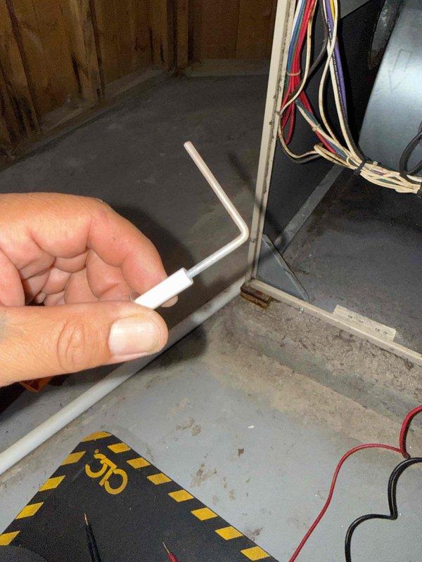 Performed comprehensive HVAC inspection for certificate of occupancy on 20-year-old system located in basement. Conducted temperature measurements across heat exchanger coils, verified proper operation of blower motor assembly, and inspected all electrical connections. Inspection included complete evaluation of humidifier, thermostat functionality, and hot water tank, with all components found to be operating within acceptable parameters for certification requirements.