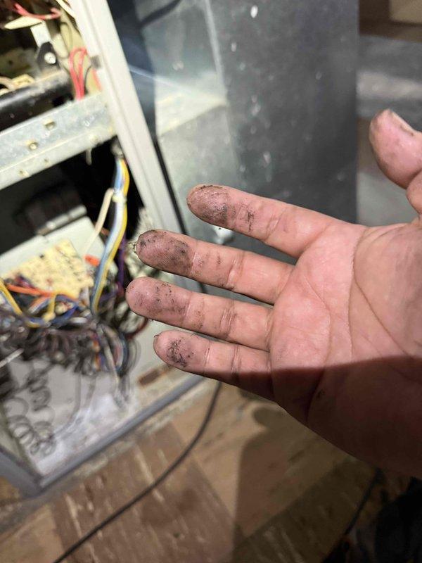 Responded to no cooling complaint on 22-year-old cooling system located in basement. Upon arrival, performed diagnostic testing on condenser unit and confirmed condenser fan motor failure. Used digital multimeter to test capacitor and verify electrical readings at the unit. Inspection revealed severely corroded refrigerant lines and compromised metal components with significant oxidation and rust buildup throughout the outdoor unit. Accessed control board and internal wiring to complete electrical diagnostics. Given the age of the equipment, extensive corrosion damage, and failed condenser fan motor, recommended full system replacement rather than repair. Discussed findings and replacement options with homeowner.