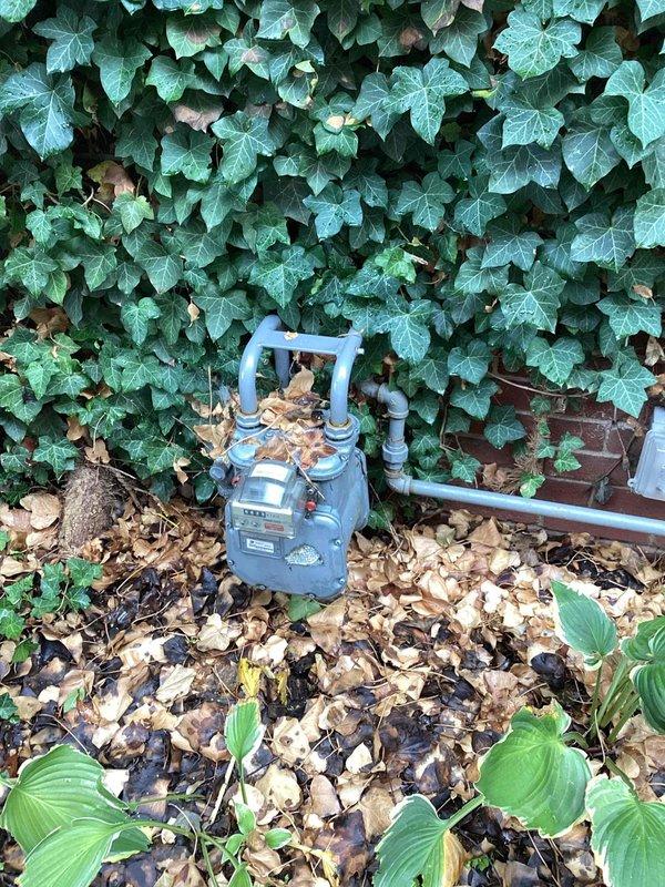 Conducted on-site assessment for whole-house generator installation at residential property. Evaluated existing natural gas meter location and accessibility for generator fuel supply connection. Gas meter currently positioned at ground level against brick exterior wall with adequate clearance from landscaping. Photographed utility connection point to document existing infrastructure and determine appropriate tap location for generator gas line.

Inspected interior workshop space identified as potential location for transfer switch and electrical distribution equipment. Assessed existing electrical panel accessibility and available workspace for installation of automatic transfer switch. Documented current conditions including ceiling structure, available mounting surfaces, and workspace constraints for equipment installation planning.

Provided comprehensive estimate for complete standby generator system including generator unit sizing recommendations, automatic transfer switch install