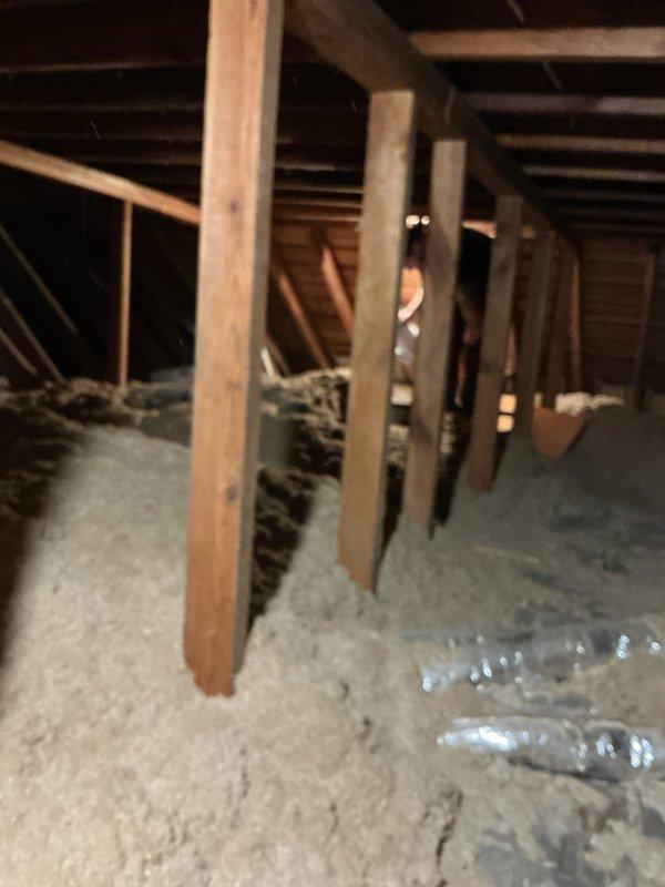 Conducted comprehensive assessment of non-functional UNICO high-velocity HVAC system installed in 2002 and located in attic space. Evaluated existing equipment configuration, ductwork layout including flexible aluminum ducting, and ceiling-mounted supply registers to provide replacement estimate for new system utilizing natural gas fuel source. Documented attic installation environment, structural conditions, and existing distribution components to develop accurate equipment replacement specifications.