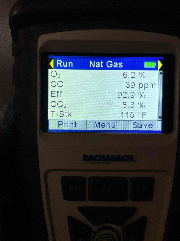 Completed Gold-level furnace maintenance inspection on 8-year-old unit located in basement. Performed comprehensive combustion analysis using calibrated diagnostic equipment, confirming natural gas furnace operating at 92.9% efficiency with oxygen levels at 6.2%, carbon monoxide at 39 ppm, carbon dioxide at 8.3%, and stack temperature at 115°F—all readings within acceptable parameters. Inspected all accessible furnace components including heat exchanger, burner assembly, flue pipe, and venting system; verified proper operation and structural integrity of all systems with no immediate safety concerns identified.