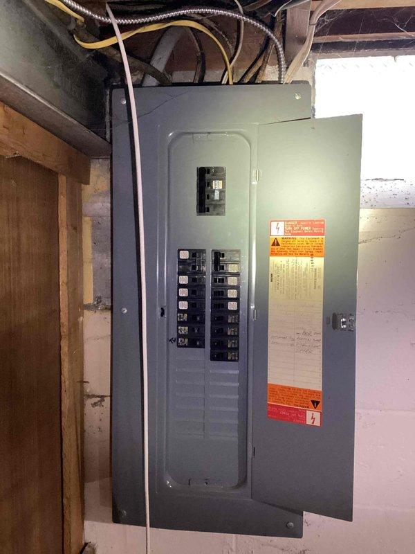 Responded to service call for 22-year-old cooling system with failed condenser fan motor located in basement. Performed comprehensive system evaluation and determined equipment had reached end of serviceable life. Provided full HVAC system replacement estimate to address failed components and aging infrastructure.