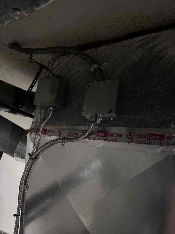 Completed full HVAC system installation including a 70,000 BTU furnace, 2-ton air conditioning unit, and humidifier with all necessary reconnections on the right side of the property. Obtained mechanical and refrigeration permits prior to installation. Installed new ductwork in confined attic space with proper securing and support, mounted all equipment overhead with appropriate mounting hardware and flexible conduit connections, and ensured all manufacturer specifications were met. System tested and verified operational upon completion, with utility rebate documentation processed.