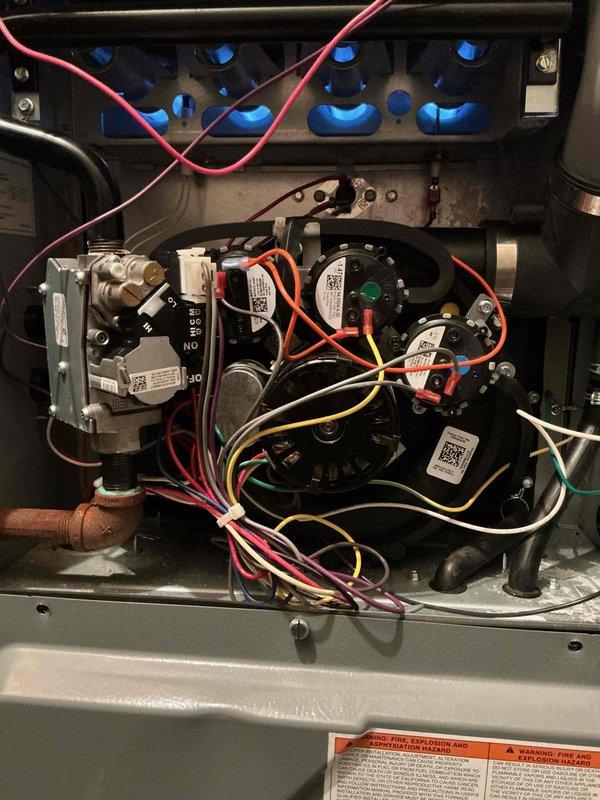 Responded to service call for unusual odor emanating from 3-year-old furnace unit located in basement. Performed thorough inspection of internal components including gas valve assembly, pressure switches, safety controls, and electrical connections. Verified all wiring harnesses, pressure switch operations, and control board functions were operating within normal parameters. Determined odor was consistent with accumulated dust burning off internal heat exchanger surfaces, which is typical for units at beginning of heating season. Advised homeowner that smell should dissipate within several hours of continuous operation and recommended no further action at this time.