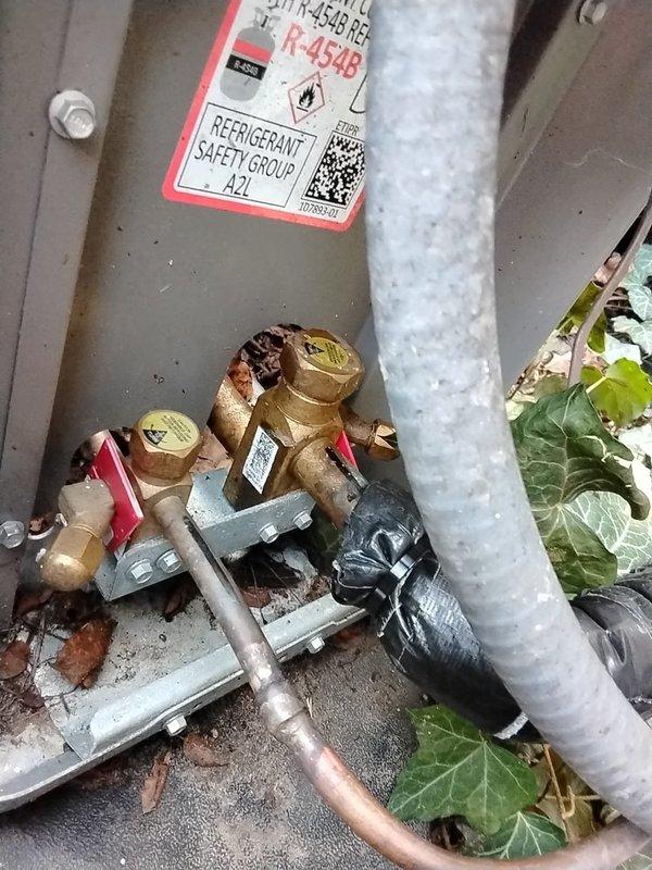 Completed electrical install warranty inspection and corrections for HVAC system. Identified and documented oversized circuit protection on air conditioning unit rated for maximum 25 amps but protected by 30 amp fuses and breaker. Installed required A2L refrigerant identification tags with red safety labels per Lennox manufacturer specifications for R-454B refrigerant system. Secured loose insulation on suction line at air handler to prevent thermal loss and condensation issues.