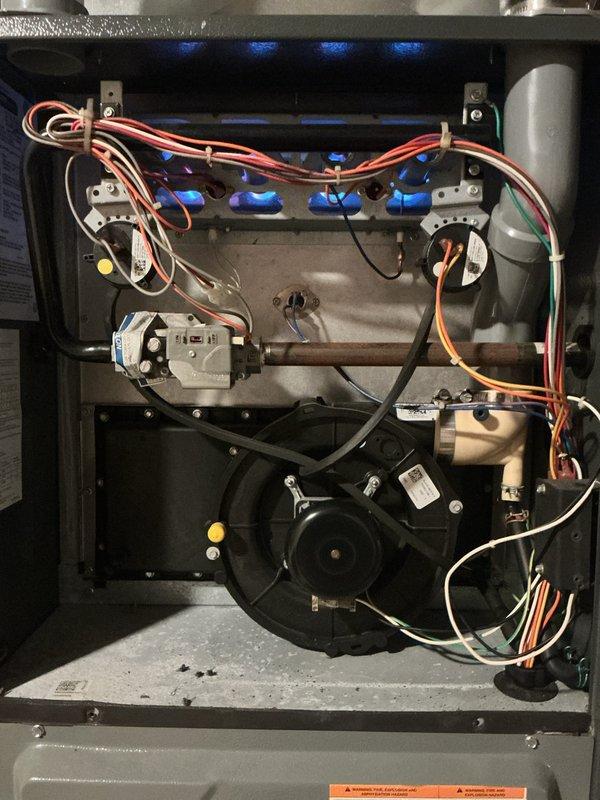 Completed comprehensive Gold Furnace Inspection on 13-year-old furnace system with units located in basement and conditioned crawl space. Performed thorough examination of both heating units, including visual inspection of heat exchangers, burner assemblies, gas valve manifolds with blue valve connections, blower motor assemblies, electrical components, control boards with operational LED indicators, and all associated wiring connections. Verified proper operation of all safety controls, checked electrical connections throughout both systems, and inspected refrigerant lines and ductwork connections. Documented equipment condition with photographic evidence showing internal components including manifold assemblies, blower motors, capacitors, control boards, and terminal blocks. All units found to be functioning within normal parameters with no immediate safety concerns identified. Systems operational and ready for heating season.