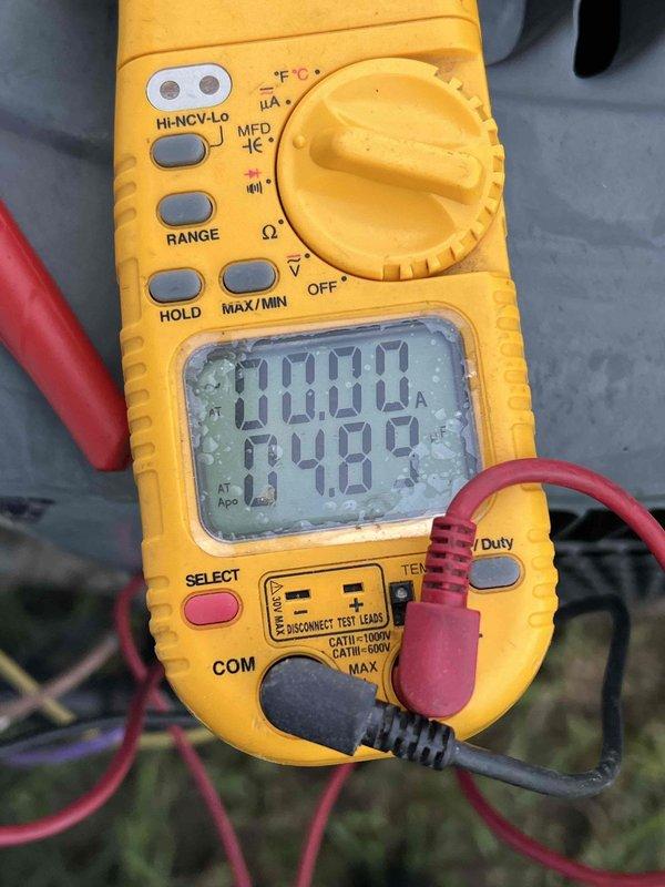 Responded to service call for 10+ year old air conditioning unit located in basement not blowing cold air. Performed diagnostic testing using digital multimeter to measure electrical values and system performance. Tested voltage, amperage, and continuity at key components to identify cause of cooling failure and determine necessary repairs.