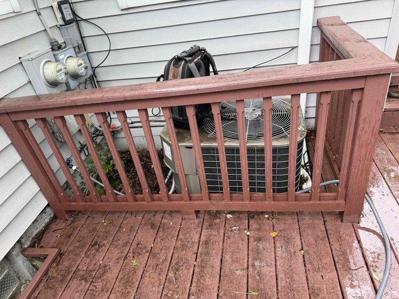 Responded to no cooling complaint on 19-year-old residential air conditioning system with outdoor condenser unit located in backyard and evaporator coil in basement. Performed diagnostic inspection of system components including condenser unit, refrigerant lines, and airflow controls. Documented equipment condition with photographs showing weathered outdoor unit with protective cover and basement damper assembly with visible dust accumulation on blades and mounting frame. System evaluated for age-related wear and operational efficiency given equipment has exceeded typical service life expectancy.