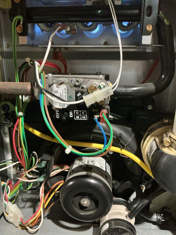 Completed comprehensive Gold-level furnace inspection on residential heating unit installed in 2018. Performed combustion analysis using calibrated Testo 310 diagnostic equipment to measure flue gas composition, carbon monoxide levels, and combustion efficiency. Conducted thorough examination of internal components including blower motor assembly, inducer motor, control board relay module, and electrical wiring connections. Verified proper operation of all safety controls, inspected burner assembly and heat exchanger, and confirmed all wire management and connections are secure with no signs of overheating or deterioration. Unit operating within manufacturer specifications with no deficiencies noted.