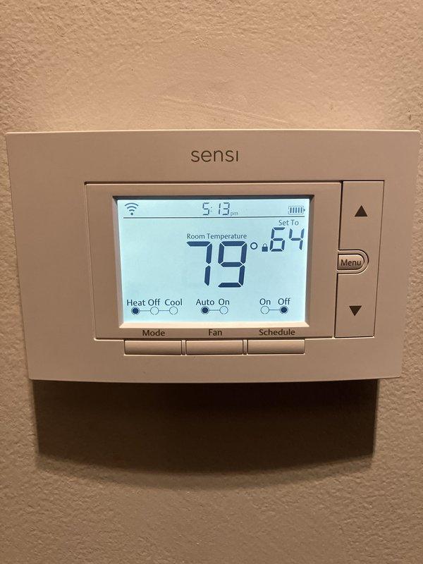 Completed full HVAC system installation including a 70,000 BTU furnace, 2-ton air conditioning unit with rear discharge configuration, humidifier, and Sensi programmable WiFi thermostat. Installed all necessary venting and drainage piping, connected ductwork to existing distribution system, and performed electrical reconnection. Mechanical and electrical permits were obtained prior to installation. System was commissioned, tested for proper operation, and qualified for utility rebate program.