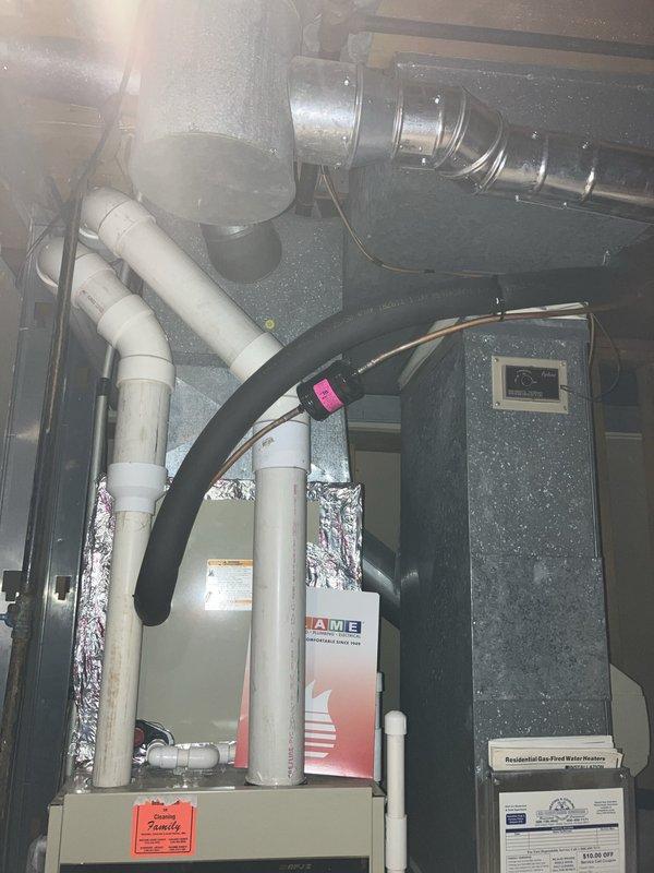 Completed estimate for furnace replacement on a 20+ year-old operational unit with air handler and filtration system currently located in mechanical room. Existing system includes PVC condensate lines, insulated ductwork, and Nest smart thermostat, all functioning but equipment has reached end of expected service life and requires replacement planning.