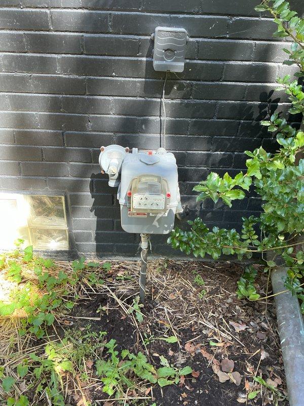 Conducted on-site electrical estimate for new whole home generator installation at residential property. Evaluated existing electrical meter installation on exterior wall and assessed backyard area for optimal generator placement, noting vegetation clearance requirements and access considerations. Provided comprehensive estimate for complete generator system installation including electrical connections, transfer switch, and necessary site preparation work.