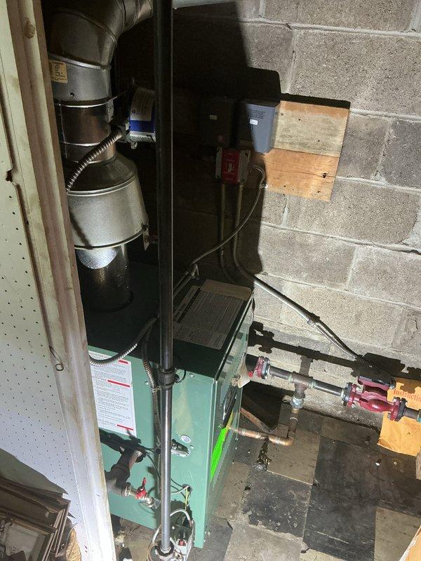 Completed comprehensive Gold Boiler Inspection on a 7-year-old hot water boiler system located in basement. Verified all operational components, inspected heat exchanger for signs of corrosion or leaks, tested safety controls and pressure relief valve, checked combustion efficiency, and confirmed proper venting and air intake. System found to be operating within normal parameters with thermostat maintaining setpoint at 76°F.
