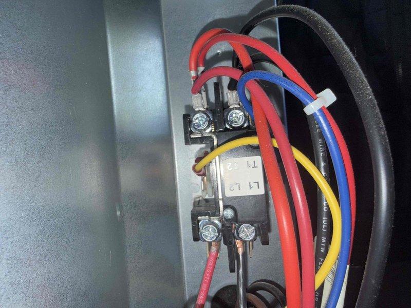 Responded to no cooling call following electrical repairs after storm and power surge. Upon arrival, found both 5-year-old AC condenser unit and 20-year-old furnace inoperative with no power to either system. Performed electrical diagnostics using clamp meter at outdoor condenser unit and inspected contactor relay connections inside electrical panel. Identified tripped breakers and damaged contactor caused by power surge. Replaced failed contactor, verified proper wire connections on all terminals, reset breakers, and restored power to both HVAC systems. Tested AC unit operation with multimeter readings confirming proper voltage and amperage. System cycling normally with adequate airflow and cooling restored to residence.