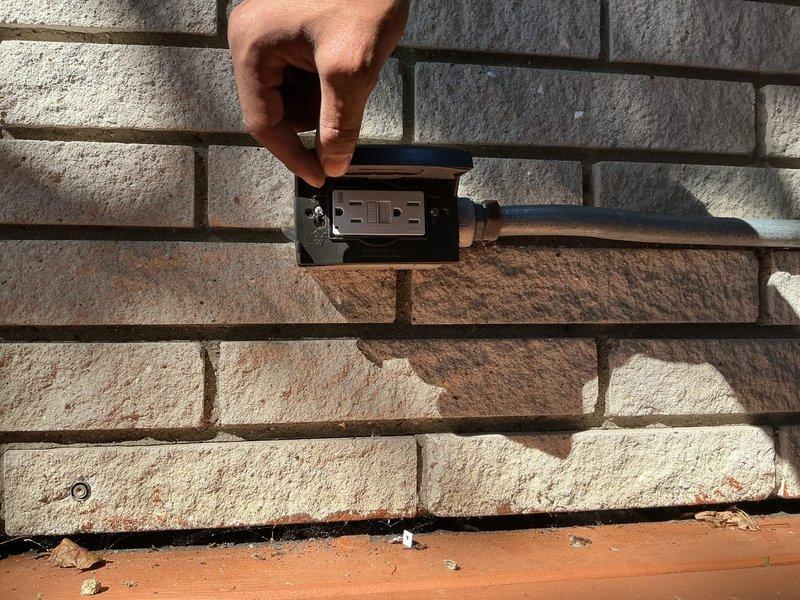 Responded to service call for multiple electrical concerns including non-functional outdoor outlet, Ring video doorbell installation, and kitchen light fixture replacement. Successfully installed Ring video doorbell on exterior wall near mailbox, ensuring proper mounting and electrical connection. Troubleshot and repaired non-operational GFCI outlet on exterior stone wall at rear of residence, restoring power to the weatherproof receptacle. Replaced kitchen light fixtures per homeowner specifications, completing all requested electrical work and verifying proper operation of all components.