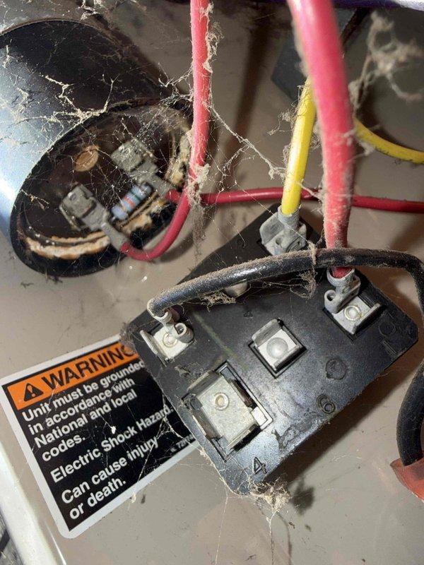 Responded to no-cooling call on 20-year-old residential air conditioning system. Upon arrival, confirmed outdoor unit was not receiving power and indoor furnace was operational. Inspected electrical disconnect at outdoor unit and found deteriorated wiring connections with significant corrosion at terminal points. Cleaned terminals, replaced damaged wire connections, and verified proper voltage supply to contactor. Cycled system multiple times to confirm successful startup and normal operation of compressor and condenser fan.