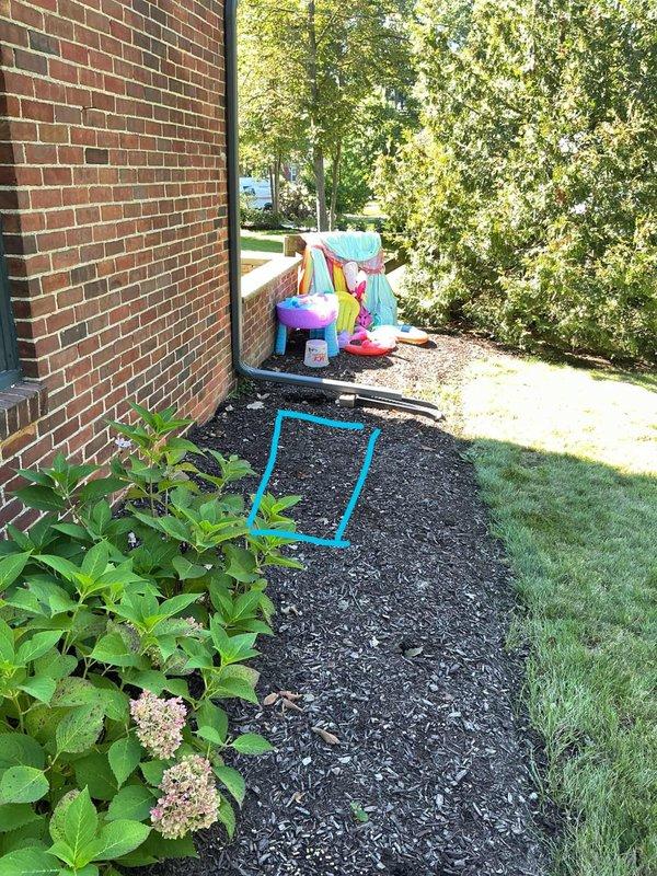 Conducted on-site evaluation for whole home generator installation. Assessed potential installation location along side yard of brick residential structure, photographing existing landscape conditions including garden beds with hydrangeas and available clearance areas. Documented prepared mulched area adjacent to brick wall that provides suitable access for generator placement, noting proximity to existing electrical service and adequate setback from structure. Evaluated site conditions including drainage considerations, accessibility for equipment delivery and installation, and compliance requirements for residential standby generator systems. Provided comprehensive estimate for complete whole home automatic standby generator system including unit sizing, transfer switch installation, and necessary electrical connections.