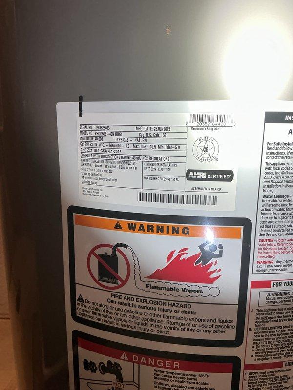 Responded to no hot water complaint at residential property. Inspected water heater unit located in basement, manufactured 04/03/2015, confirming lack of hot water production. Documented existing equipment condition with photographs showing water heater installation alongside furnace in utility room. Discussed water heater replacement options with homeowner due to age and failure of unit to produce hot water.