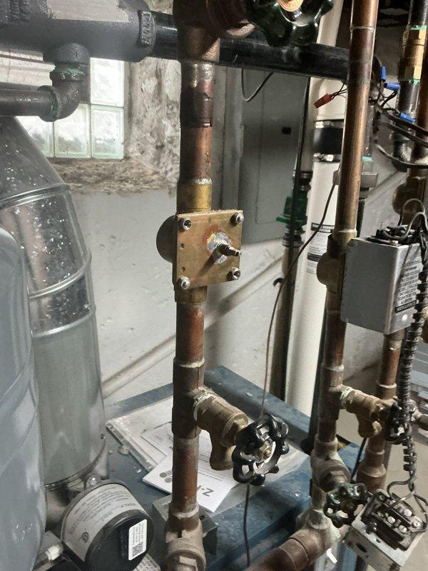Responded to service call for bedroom thermostat that would not shut off in a multi-zone hydronic heating system. Diagnosed faulty zone valve operation preventing proper zone isolation. Replaced defective Honeywell 2-wire zone valve on bedroom heating zone with new unit from shop stock. Verified proper thermostat control, zone valve cycling, and system operation across all zones upon completion.