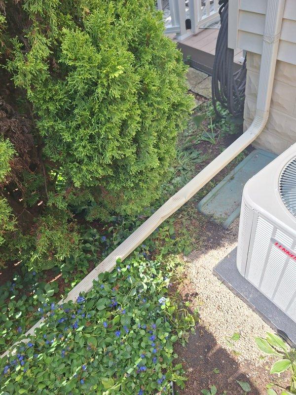 Completed installation of 2-ton Lennox air conditioning system with matching evaporator coil. Installed Lennox model CK40CT-24B-71 coil unit factory-equipped with TXV for R-454B refrigerant, with serial number 1526F36651. Positioned condenser unit on concrete pad in side yard location with proper clearances, reconnected electrical service, and completed all mechanical connections. Requested and coordinated mechanical and electrical permits for the installation. System tested and operational upon completion.