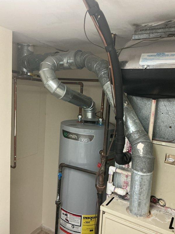Provided comprehensive estimate for natural gas furnace replacement in utility room. Current 10+ year old unit is operational but customer seeking replacement options. Evaluated existing HVAC configuration including ductwork connections, gas line routing, and clearance requirements in confined mechanical space shared with water heater and electrical panel.
