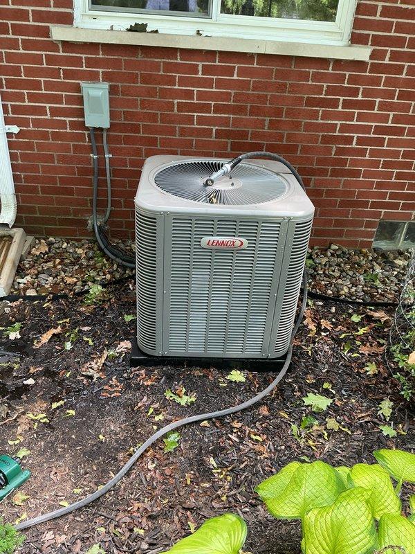 Responded to service call for water leaking from underneath a 4-year-old furnace located in basement. Upon inspection, identified condensate drainage issue causing water accumulation. Cleared condensate line obstruction, verified proper drainage flow, and tested system operation to ensure leak was resolved. Inspected surrounding area for water damage and confirmed furnace returned to normal operation without further leakage.