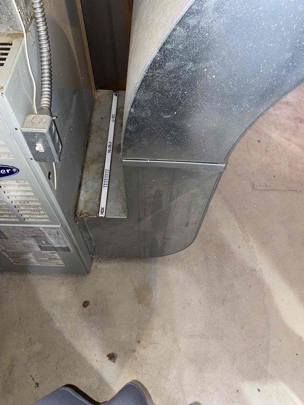 Completed comprehensive HVAC system estimate for replacement of 22-year-old Carrier ground-level unit. Assessed existing equipment configuration in basement utility area, documented current ductwork layout and connections, and photographed installation conditions to provide accurate full system replacement recommendations for aging heating and cooling equipment that has reached end of service life.