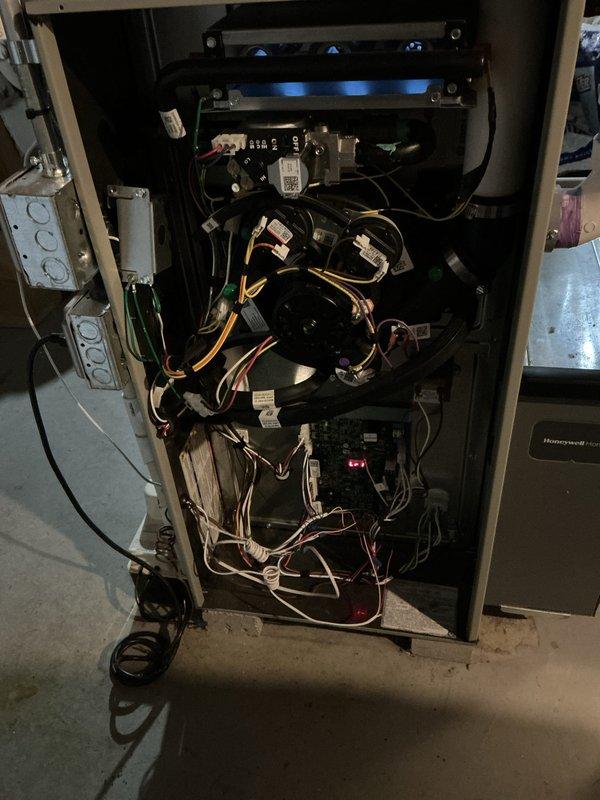 Completed Gold Furnace Inspection on a 4-year-old residential heating system located in the basement. Performed comprehensive combustion analysis using Testo 310 digital analyzer to verify proper burner operation and efficiency levels. Conducted thorough visual inspection of all internal components including gas burners (confirmed proper flame characteristics with blue flame indicators), electrical systems, control boards, transformers, and wiring connections. Verified all safety controls, limit switches, and electrical connections are secure and functioning within manufacturer specifications. Unit is operating properly with no deficiencies noted at this time.