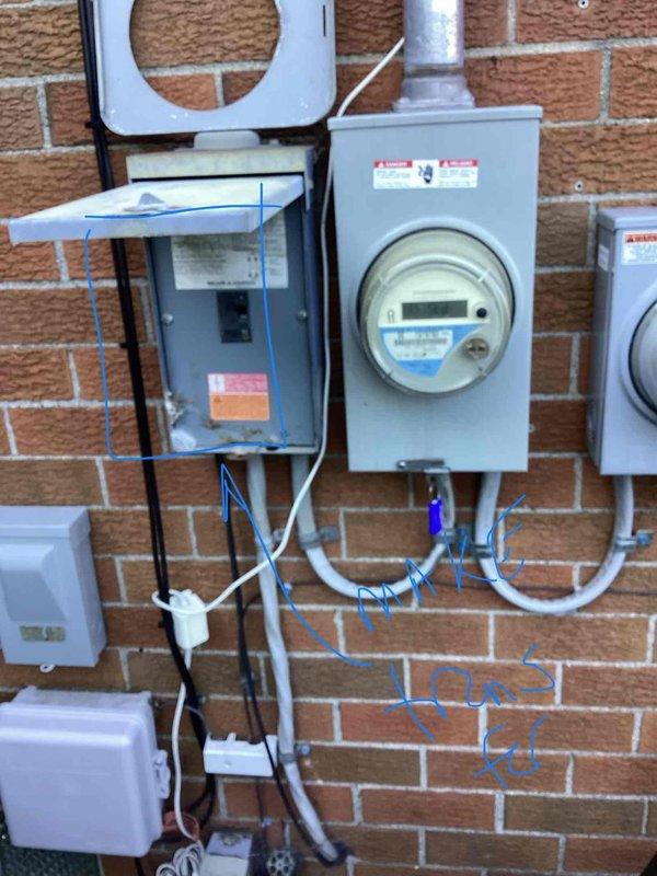 Conducted on-site evaluation for new whole home generator installation at manufactured home. Assessed existing electrical service infrastructure including main meter assembly, panel configuration, and available mounting locations on exterior brick wall. Documented current electrical setup with multiple meter boxes, conduit routing, and service disconnect components to determine optimal generator placement and necessary electrical connections for seamless integration with existing system.