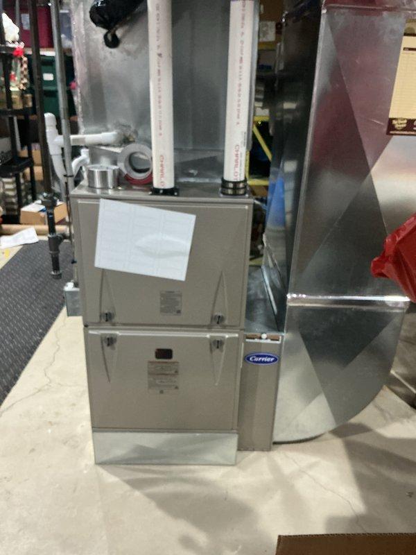 Conducted estimate for replacement of 10+ year old air conditioning system and natural gas furnace located in basement. Current Carrier furnace unit and AC system are operational but have reached end of expected service life. Evaluated existing equipment configuration, ductwork connections, and thermostat setup to provide comprehensive replacement options for complete HVAC system upgrade.