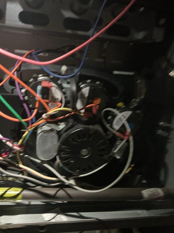 Completed preventive maintenance tune-up on a 5-year-old residential heating system at a church-owned property. Performed comprehensive system inspection, including examination of blower motor assemblies, electrical connections, and capacitor components. All wiring connections were verified secure, motors tested for proper operation, and system confirmed to be functioning within normal parameters with no adjustments required.