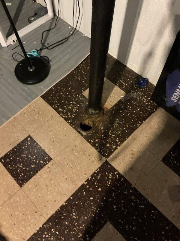 Responded to intermittent toilet gurgling and slow drainage issue affecting main level bathroom. Evaluated drain and vent system to identify potential partial blockage or venting deficiency, noting property's previous history of stack-related sewage backup. Performed diagnostic inspection of plumbing system, documented conditions with photographic evidence, and assessed drainage performance to determine root cause of recurring symptoms isolated to single fixture.