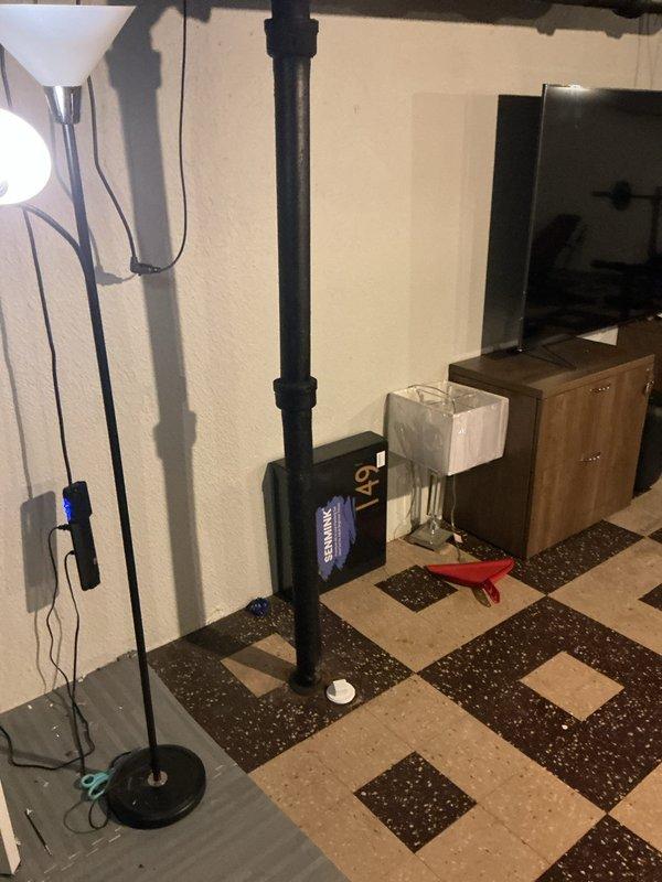 Responded to intermittent toilet gurgling and slow drainage issue affecting main level bathroom. Evaluated drain and vent system to identify potential partial blockage or venting deficiency, noting property's previous history of stack-related sewage backup. Performed diagnostic inspection of plumbing system, documented conditions with photographic evidence, and assessed drainage performance to determine root cause of recurring symptoms isolated to single fixture.