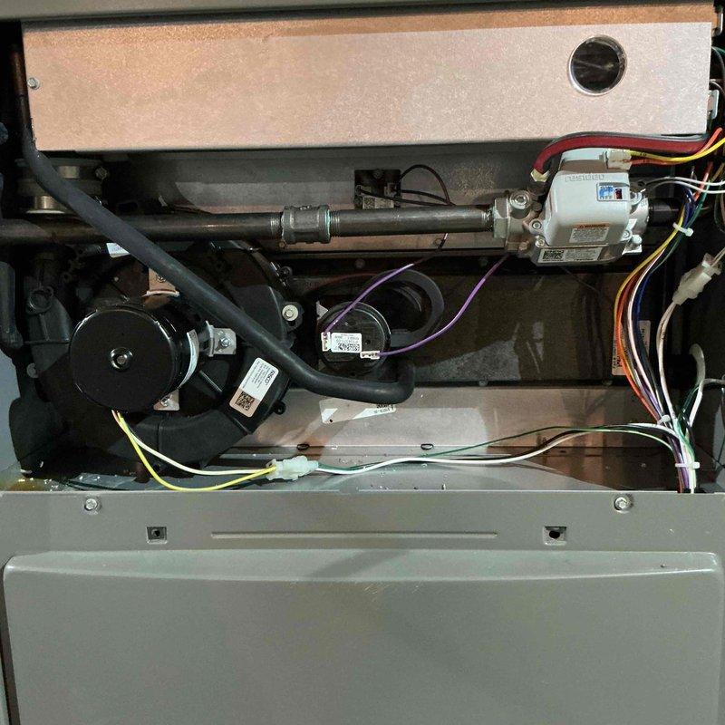 Completed comprehensive Gold-level furnace inspection on 3-year-old forced air heating system located in basement. Inspected all internal mechanical components including blower motor assembly, gas valve, ignition system, and electrical connections. Verified proper operation of all safety controls, tested inducer motor and pressure switches, and examined heat exchanger for signs of wear or damage. All components found to be in good working condition with no deficiencies noted.