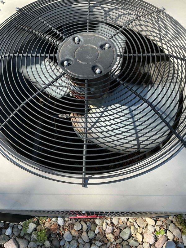 Completed comprehensive gold-level tune-up and inspection on 10-year-old gas furnace and air conditioning system located in basement. Performed thorough examination of furnace burner assembly, confirmed proper blue flame combustion pattern, inspected blower motor housing and electrical connections, and verified all wiring integrity. Inspected outdoor condenser unit including fan assembly, protective grill guard, and motor operation. All components found operating within normal parameters with no immediate service needs identified at this time.