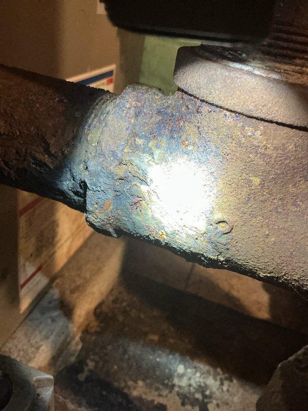 Responded to service call for piping estimate in basement area. Upon inspection, identified significant moisture issues with heavy frost and ice buildup on metal ductwork and condensation on PVC piping, indicating temperature differential problems. Confirmed presence of asbestos-containing materials on existing piping system that requires professional abatement prior to any repair or replacement work. Documented conditions with photographs and advised homeowner that piping replacement cannot proceed until certified asbestos removal is completed in affected area.