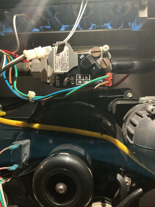 Completed comprehensive Gold Furnace Inspection and tune-up on two residential furnace units (12-year-old and 5-year-old systems). Performed thorough inspection of internal components including gas valve assembly, electrical connections, blower motor, and capacitor housing. Verified proper operation of all safety controls and gas valve connections with associated wiring (red, green, blue, and white leads). Inspected air filter assembly and blower housing, confirming adequate airflow through the system. Examined ductwork and noted normal operational wear. All components functioning within manufacturer specifications, and both heating systems confirmed operational and working properly at time of service.