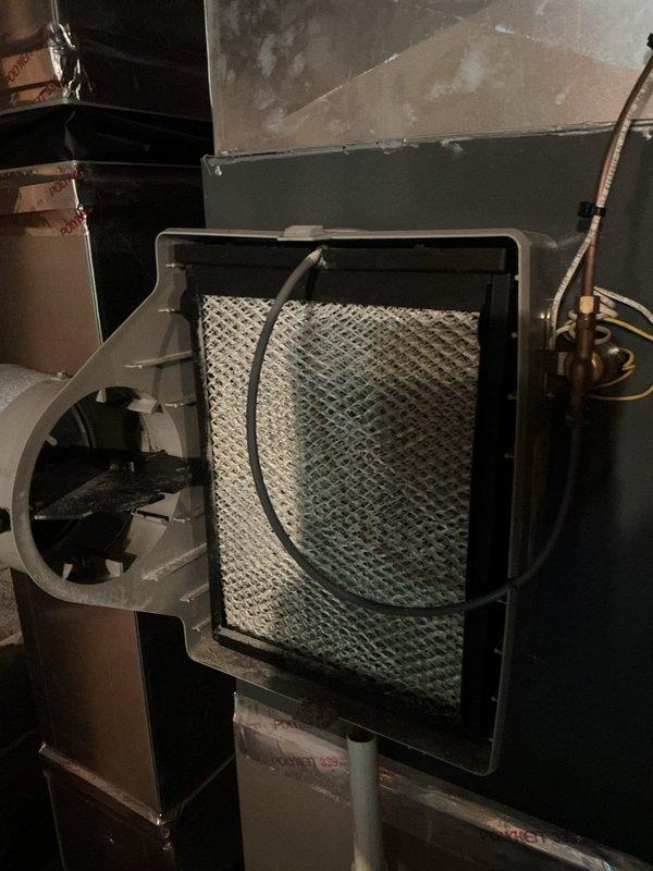 Completed comprehensive Gold Furnace Inspection and tune-up on two residential furnace units (12-year-old and 5-year-old systems). Performed thorough inspection of internal components including gas valve assembly, electrical connections, blower motor, and capacitor housing. Verified proper operation of all safety controls and gas valve connections with associated wiring (red, green, blue, and white leads). Inspected air filter assembly and blower housing, confirming adequate airflow through the system. Examined ductwork and noted normal operational wear. All components functioning within manufacturer specifications, and both heating systems confirmed operational and working properly at time of service.