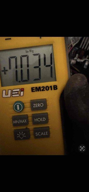 Installed 70,000 BTU furnace with mechanical permit compliance. Completed all reconnections and performed pressure measurements using calibrated manometer, verifying static pressure readings of 1.865 In-Wg and -0.034 In-Wg to ensure proper system operation and airflow balance.