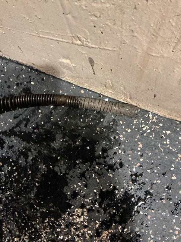Responded to clogged drain service call and performed mechanical drain snaking without camera inspection. Successfully cleared blockage in floor drain system using manual drain snake equipment. Verified proper drainage flow upon completion and left area clean and operational.