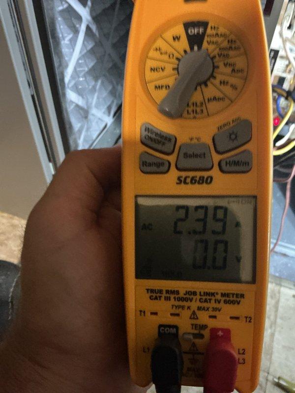 Responded to service call for gurgling noise coming from 2017 forced air furnace located in basement. Performed comprehensive inspection of heating system following previous repairs. Utilized Fieldpiece SC680 true RMS clamp meter to verify electrical readings and system performance. Measured incoming line voltage at 239 VAC, confirming proper power supply to unit. Tested amperage draw on system components, recording 10.2 amps during operation, which falls within normal operating parameters for equipment of this age and type. Inspected all accessible ductwork, condensate drainage system, and heat exchanger for potential sources of unusual sounds. Checked for proper condensate trap water level and drainage flow, as gurgling noises commonly originate from condensate system issues. Verified all electrical connections were secure and properly terminated. System operational at time of departure with no abnormal sounds detected during testing cycle.