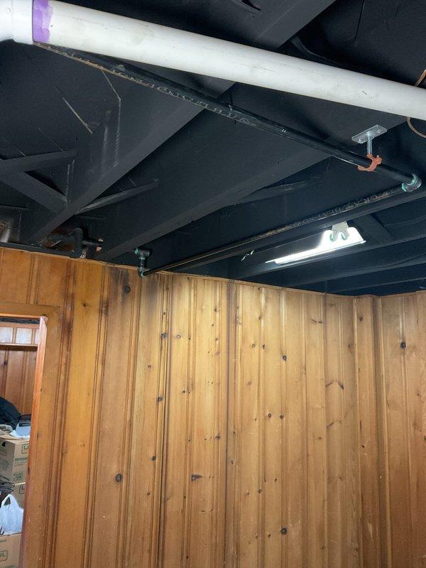 Installed gas line for dryer per approved estimate in basement location. Routed new gas piping through exposed ceiling joists using proper hangers and supports, connecting to existing gas supply system. All work completed to code specifications with pressure testing performed to ensure system integrity and safety.