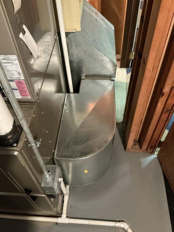 Completed comprehensive furnace inspection and replacement estimate for 10+ year old Bryant forced air system located in basement. Performed standard gold-level inspection protocol, replaced 20x25x4 air filter as requested, and documented existing equipment configuration including furnace unit, water heater, PVC venting system, and ductwork connections. Assessed current system condition and provided detailed replacement recommendations with photographic documentation of installation layout and mechanical components.