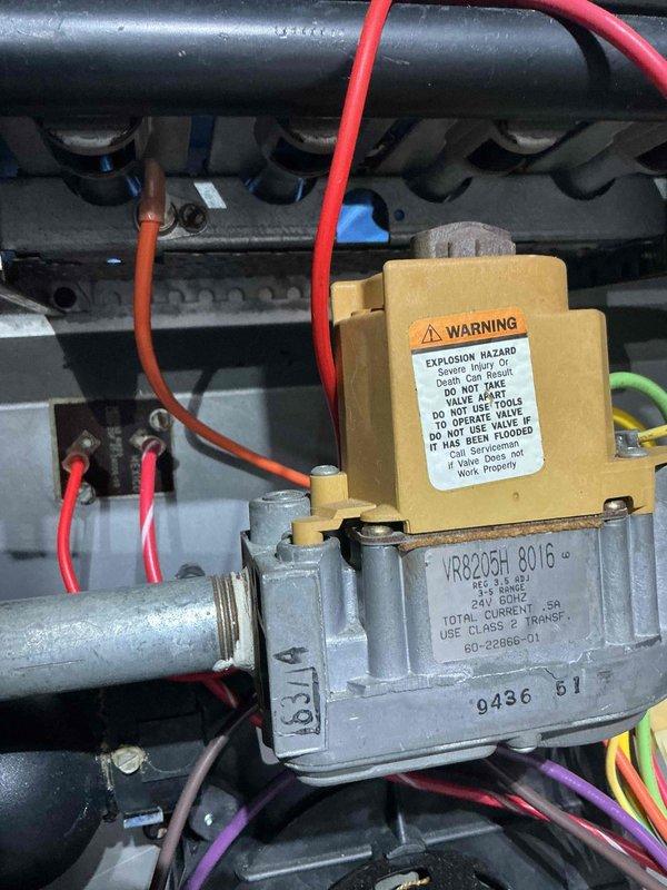 Completed comprehensive furnace tune-up and inspection on 10+ year old unit located in basement laundry room. Performed thorough visual inspection of gas valve assembly (Model VRR205H 8016), verified all electrical connections including multi-colored wiring harnesses, and confirmed proper operation of 24V control system. Conducted internal ductwork inspection using borescope camera, documenting condition of flexible duct material and interior surfaces. All safety controls tested and operational, gas valve functioning properly with no leaks detected. System showed normal wear consistent with age, with no evidence of storm-related damage observed. Furnace remains serviceable with proper maintenance and no immediate replacement necessary at this time.