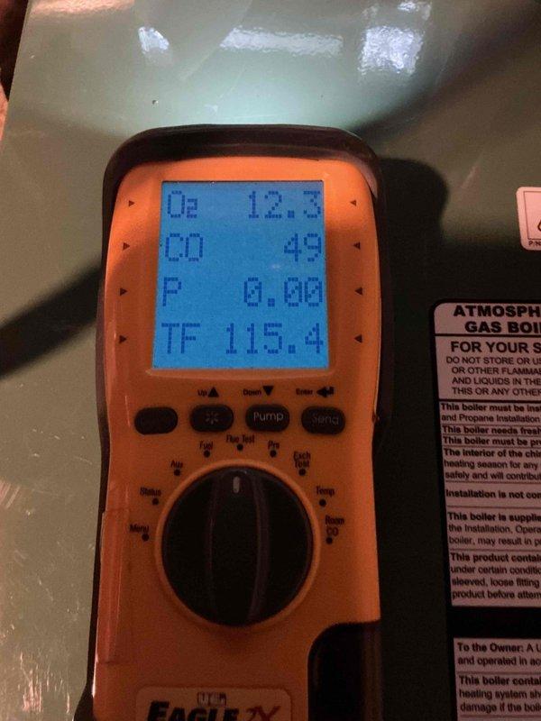 Completed comprehensive Gold boiler inspection and tune-up on 13-year-old New Yorker unit located in basement. Performed combustion analysis using digital diagnostic equipment, confirming optimal readings with O2 at 20.9%, CO at 0 ppm, and system operating within manufacturer specifications. Unit is functioning properly with no issues identified; complimentary maintenance visit completed as part of monthly service plan.