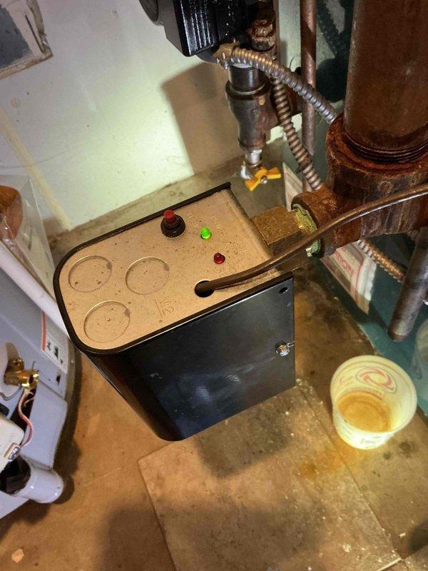 Completed annual Gold boiler inspection and cleaning on a 21-year-old Burnham 206NCL-GEI2 unit located in basement. Performed comprehensive tune-up including combustion analysis, heat exchanger inspection, burner cleaning, and safety control verification. All components operating within manufacturer specifications with no deficiencies noted. System ready for continued service with next maintenance scheduled for 2026.