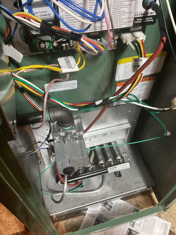 Completed full boiler installation with four-zone hydronic heating system, including installation of new boiler unit, four thermostats, four zone valves, and system controller. Established all electrical and mechanical connections, performed system startup and testing to verify proper operation of all zones. Mechanical and electrical permits secured prior to installation, with all required financing documentation completed and signed by loan holder before departure from property.