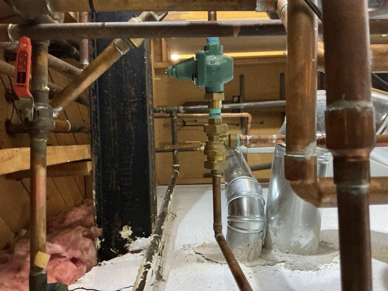 Completed comprehensive Gold-level preventive maintenance inspection on residential boiler system located in basement. Inspected all major components including heat exchanger, pressure controls, circulator pump, zone valves, and piping network. Verified proper operation of pressure regulator assembly, tested all safety controls, examined copper piping for leaks or corrosion, and confirmed adequate system pressurization. All components found to be functioning within normal operating parameters with no immediate repairs required. System is operating efficiently and safely for continued service.