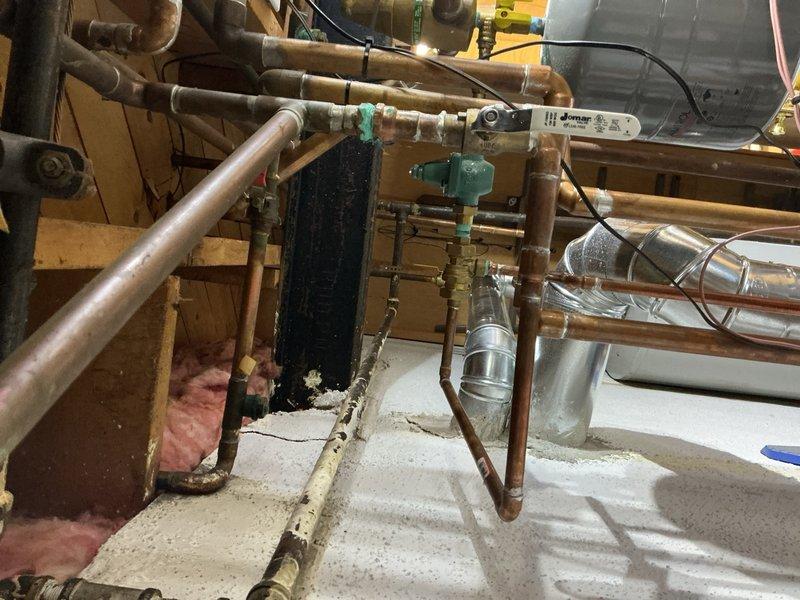 Completed comprehensive Gold-level preventive maintenance inspection on residential boiler system located in basement. Inspected all major components including heat exchanger, pressure controls, circulator pump, zone valves, and piping network. Verified proper operation of pressure regulator assembly, tested all safety controls, examined copper piping for leaks or corrosion, and confirmed adequate system pressurization. All components found to be functioning within normal operating parameters with no immediate repairs required. System is operating efficiently and safely for continued service.